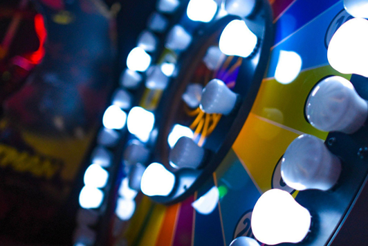 Brightly lit spinning wheel in a live dealer game show studio
